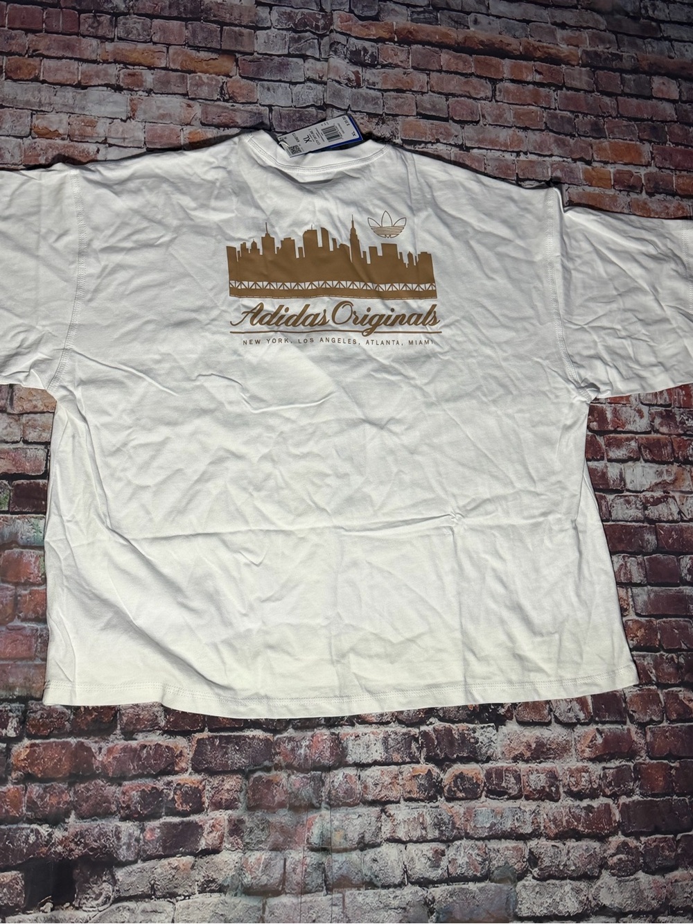 adidas Originals White Short-Sleeve Tee with Gold Skyline Graphic